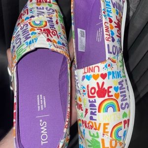 Female shoes (pride month editions Toms)